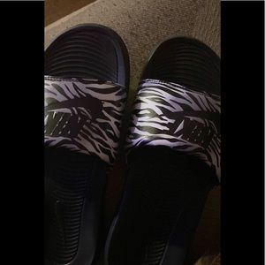 Nike slides woman’s